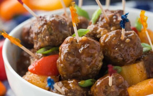 These Pineapple Brown Sugar Meatballs are smothered in a homemade BBQ sauce and cook in the slow cooker, making them an easy game day appetizer, weeknight meal, or holiday potluck offering!