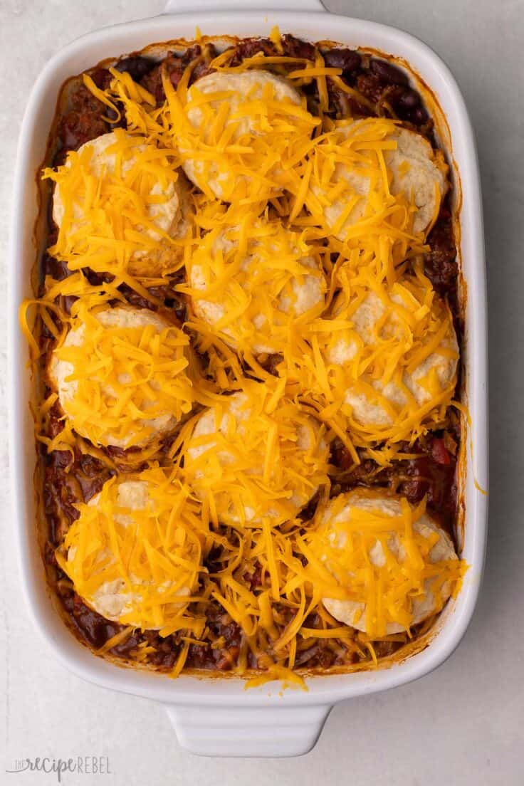 shredded cheese on top of biscuits on chili cheese casserole.