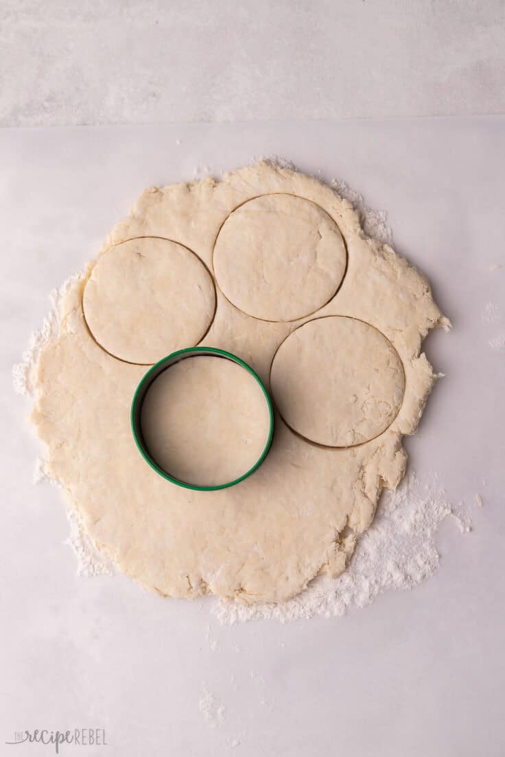 biscuit dough rolled out and cut using a round cutter.
