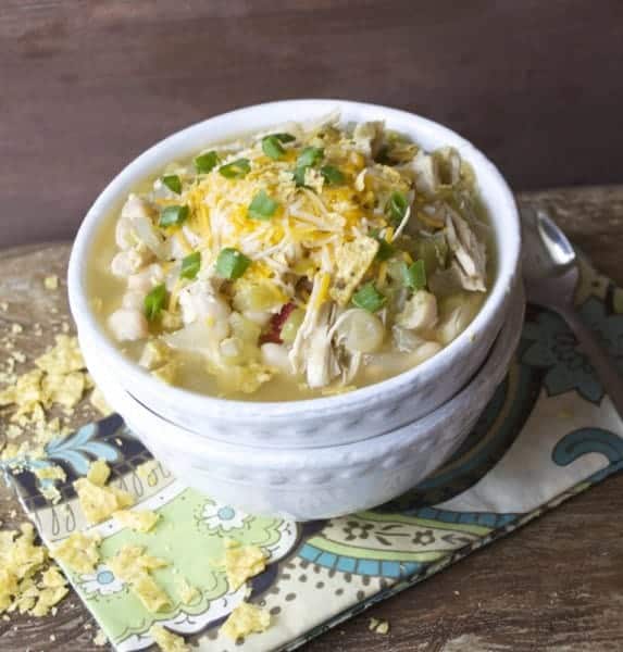 slow cooker white bean chicken chili verde in white bowl