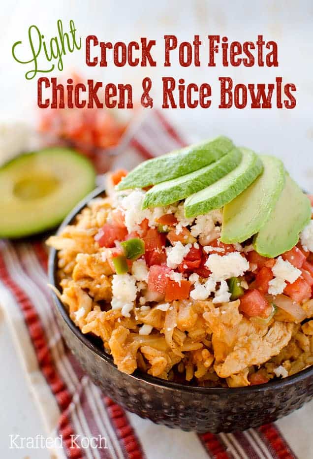 crockpot fiesta chicken and rice bowls topped with tomato and avocado slices