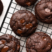 double chocolate cookies on a wire cooling rack.