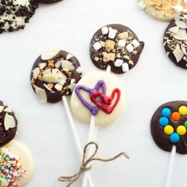 These Valentine's Day Chocolate Lollipops are an easy treat to make and attach to those valentine's -- and so easy to customize the design and toppings to your taste!