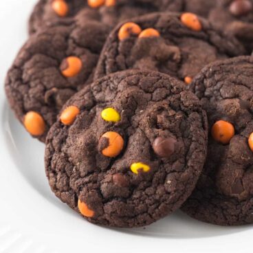 Fudgy, chewy double chocolate cookies loaded with Reese's Pieces! Chocolate peanut butter perfection :)