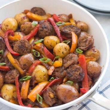 The BEST, EASIEST meal I've made in a long time! This 30 Minute BBQ Sausage, Peppers and Potato Skillet is a hearty, healthy, easy meal that only needs one pot, and it's gluten free!