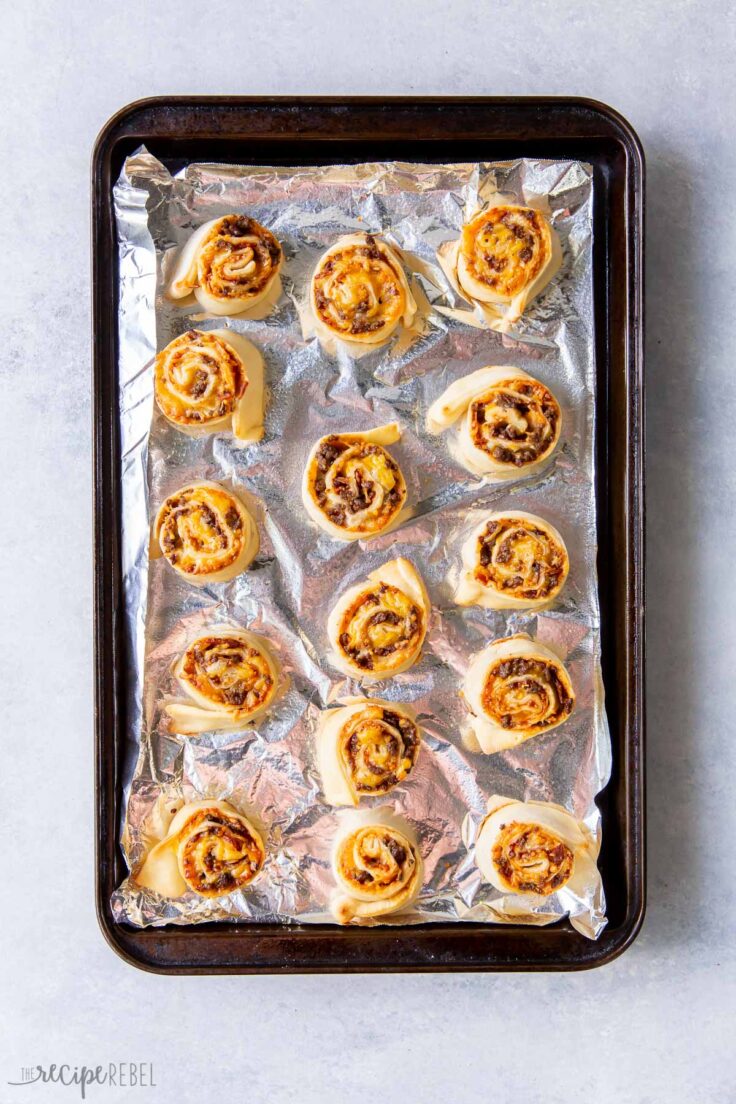 cheeseburger buns on pan lined with foil