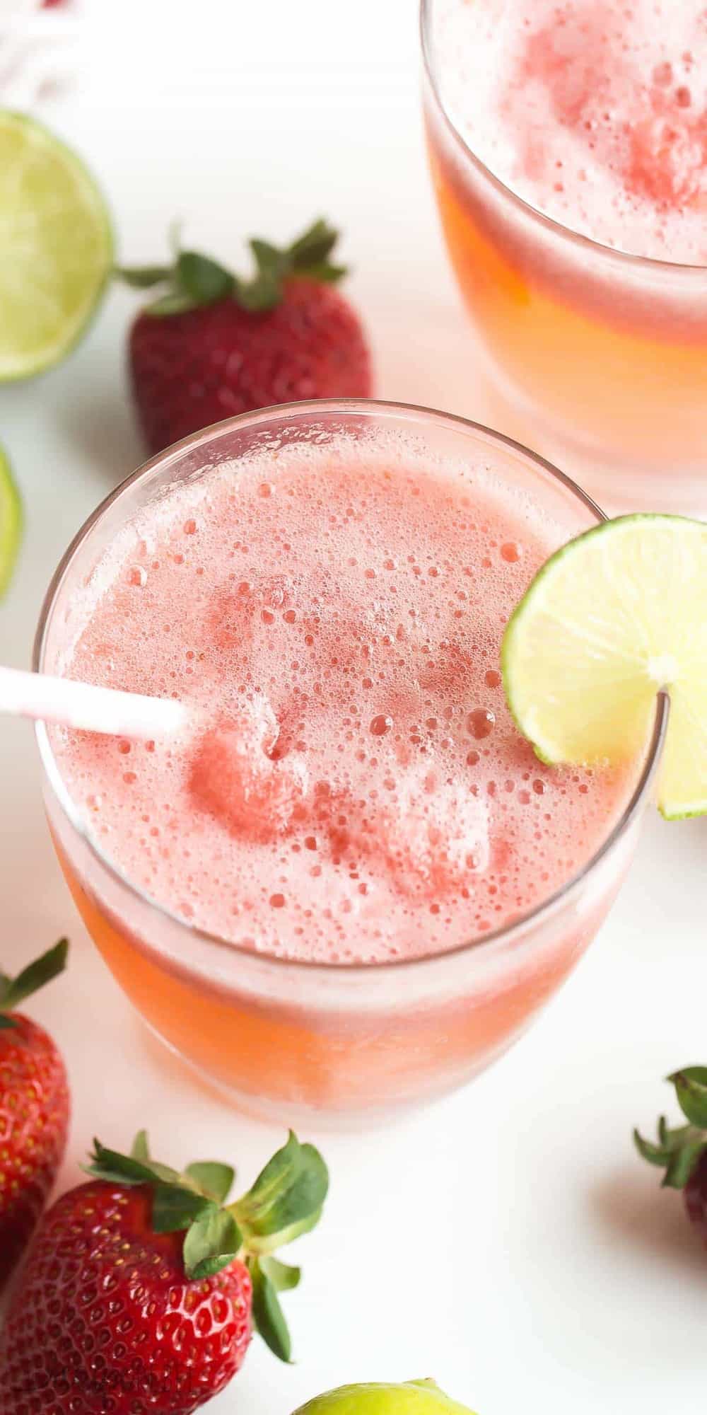 long image of berry lime slush with soda and lime slice