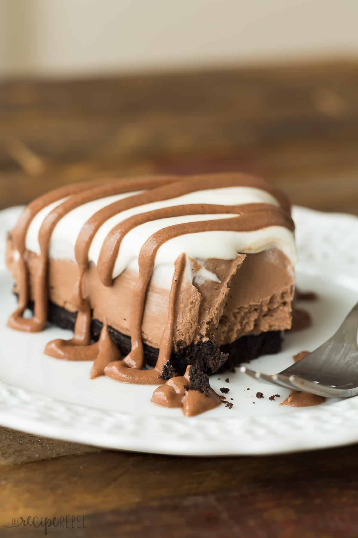https://www.thereciperebel.com/wp-content/uploads/2016/07/no-bake-brownie-batter-cheesecake-recipe-www.thereciperebel.com-2-of-2.jpg