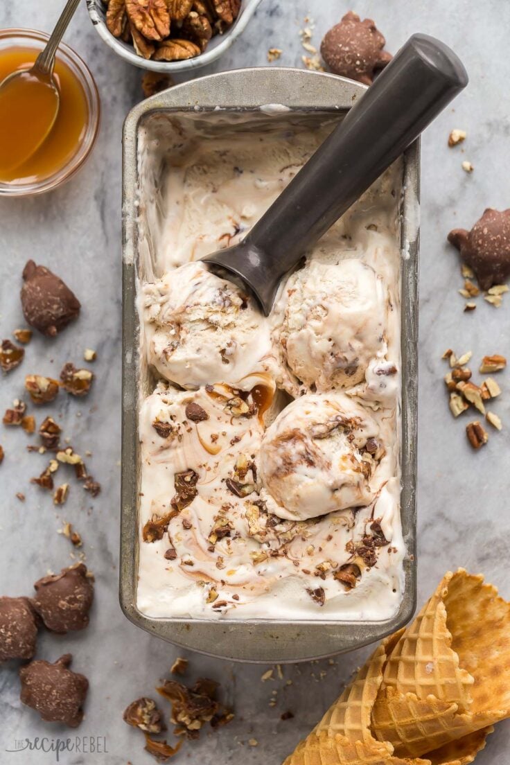 loaf pan of ice cream with scoops on top