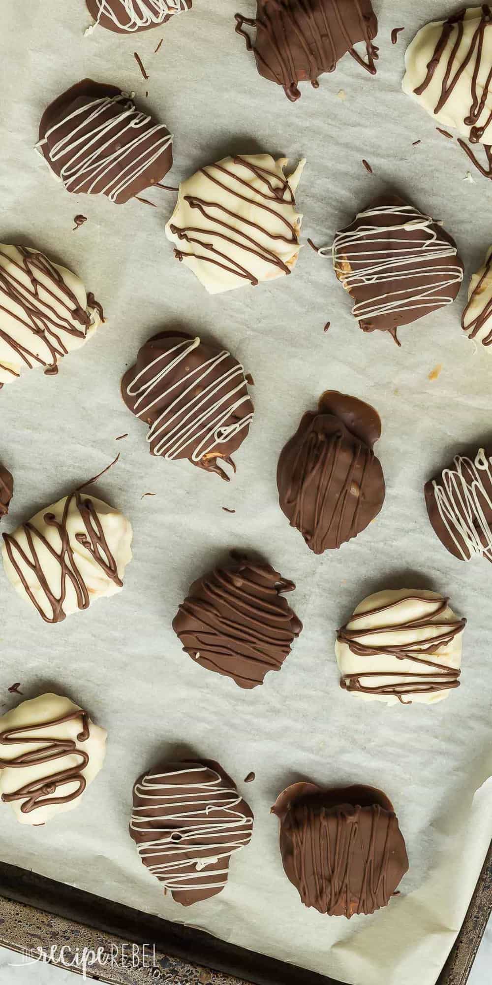 overhead long image of pan of chocolate peanut butter pretzel candies drizzled with chocolate