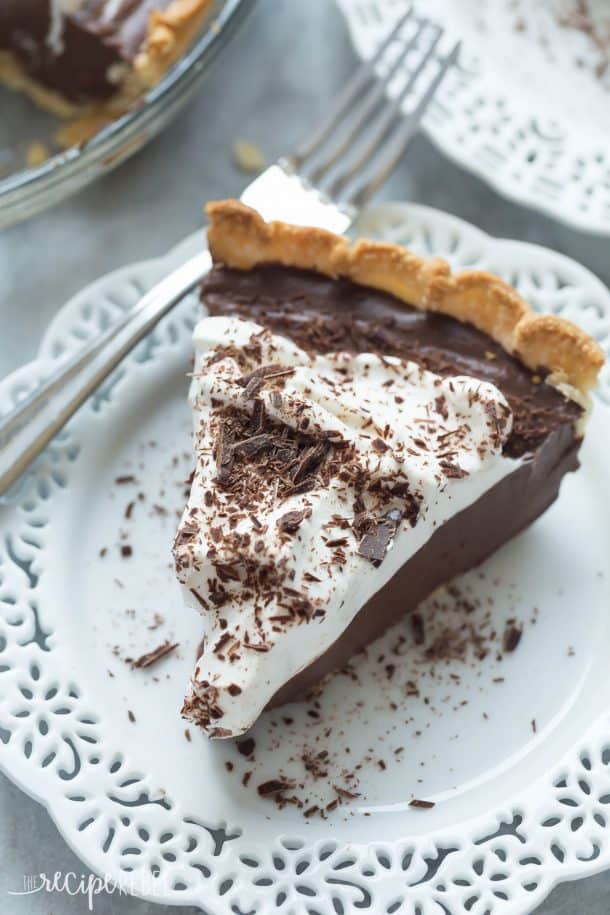 This Homemade Dark Chocolate Pudding Pie is the dessert for chocolate lovers! It is rich, smooth, creamy and made from scratch -- perfect for your holiday dessert table!