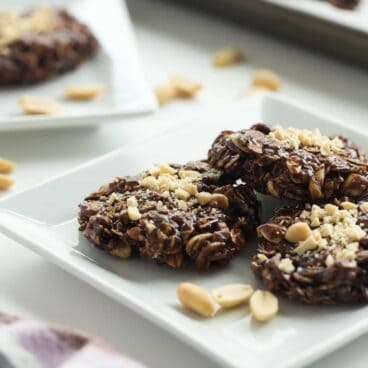 These Chocolate Peanut Butter No Bake Cookies are made better for you with no refined sugar, and a boost of protein from peanut butter, peanuts and oats! Just 10 minutes prep and easily made gluten-free.