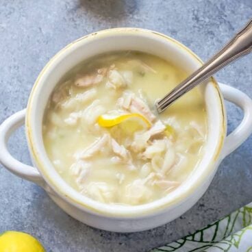 slow cooker lemon chicken soup in white bowl