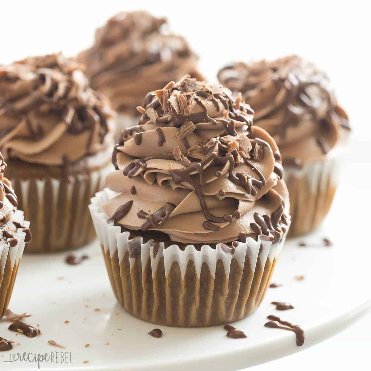 mocha nutella cupcakes square image up close with nutella frosting and chocolate drizzle