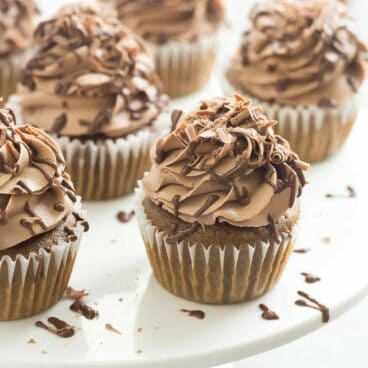 These Mocha Nutella Cupcakes are the perfect way to get your coffee fix! A moist coffee flavored cupcake topped with creamy Nutella frosting!