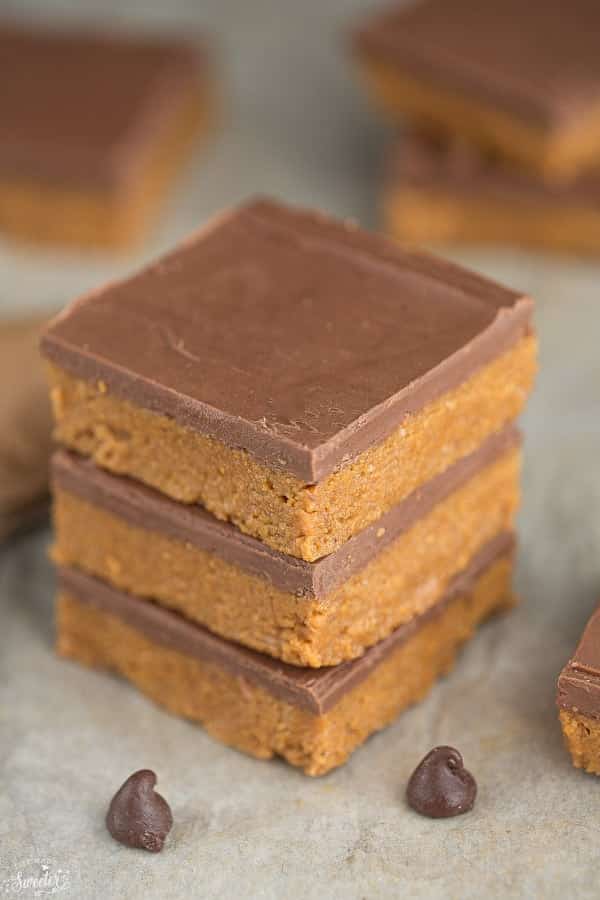no bake reese's peanut butter bars stack of 3 on grey background