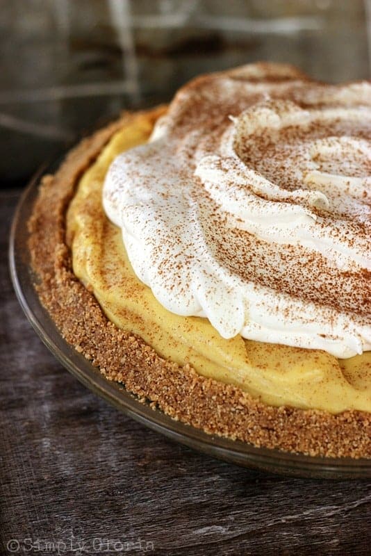 no bake eggnog pie with graham cracker crushed and dusted with cinnamon