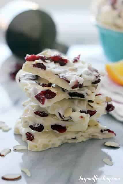 orange cranberry almond bark stack on grey marble