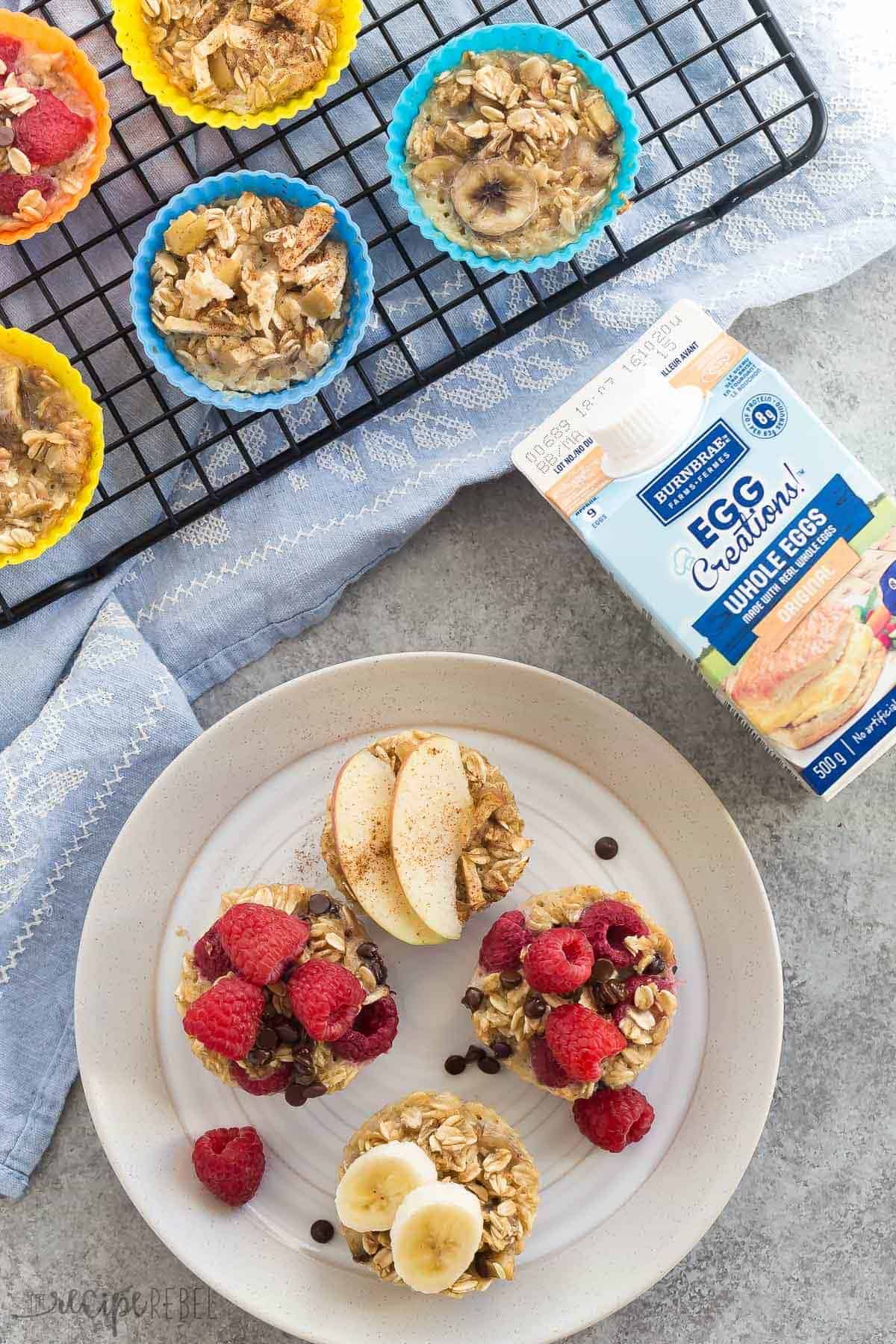 These easy baked oatmeal cups use only FOUR basic ingredients and they're perfect for breakfast, school lunches or snacks! Naturally sweetened, packed with protein, make ahead and freezer friendly with 3 different variations: raspberry chocolate chip, peanut butter banana and apple cinnamon.