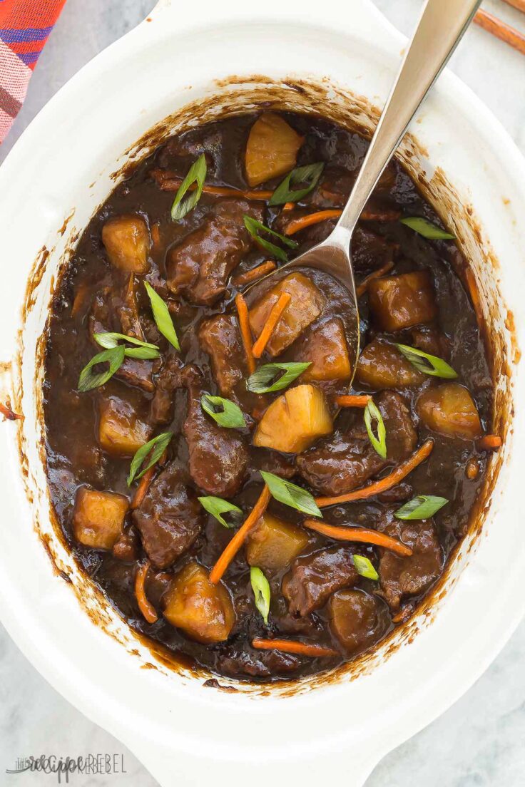 overhead image of mongolian beef with pineapple in slow cooker