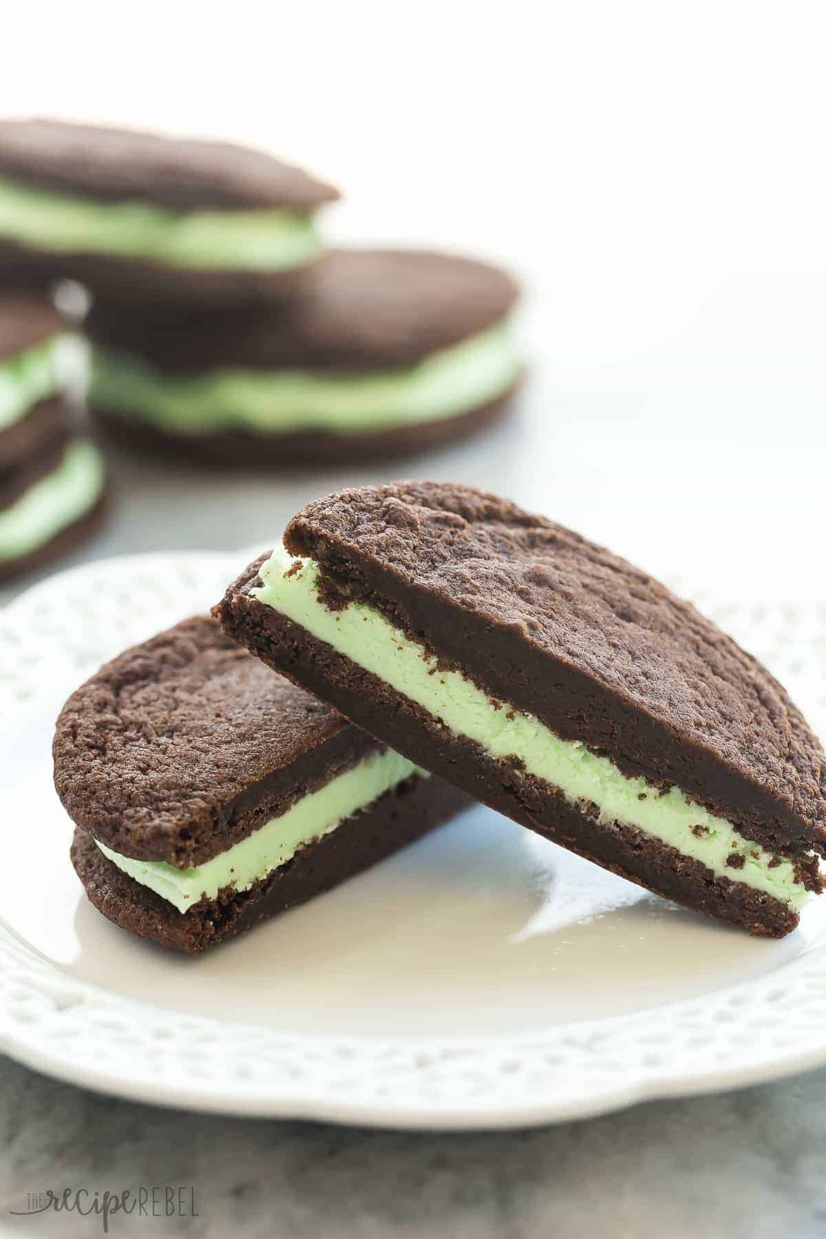 mint chocolate oreos homemade on white plate cut in half to reveal green frosting