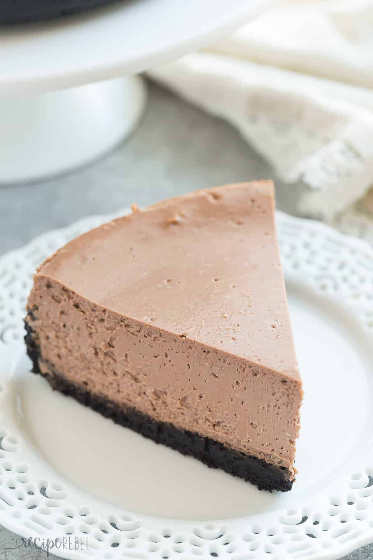 This is the BEST Chocolate Cheesecake! It's perfectly rich, creamy (with the help of Greek yogurt), and bakes up with no cracking and no water bath needed. This is the easy way to perfect baked cheesecake!