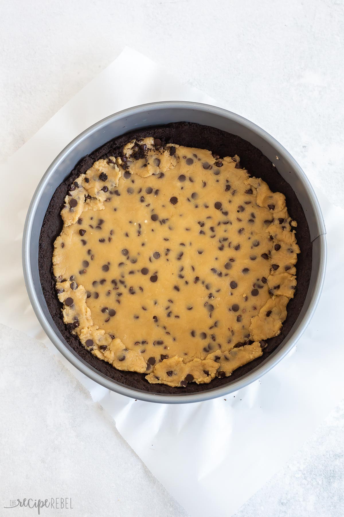 cookie dough layer pressed into cheesecake crust.