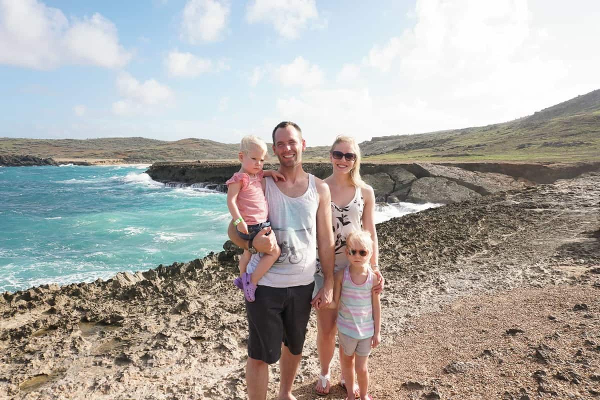 family photo in aruba next to ocean