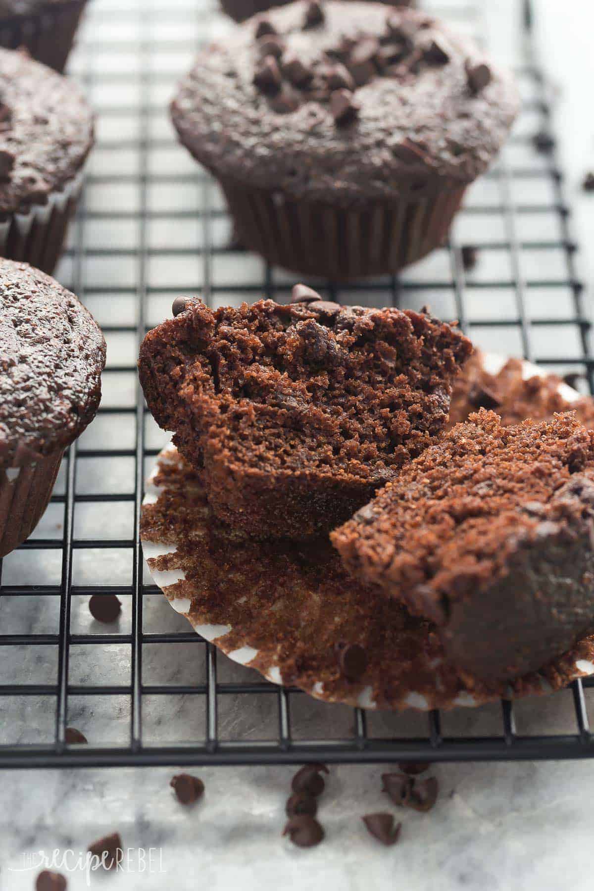 double chocolate muffin close up cut in half on black backing rack