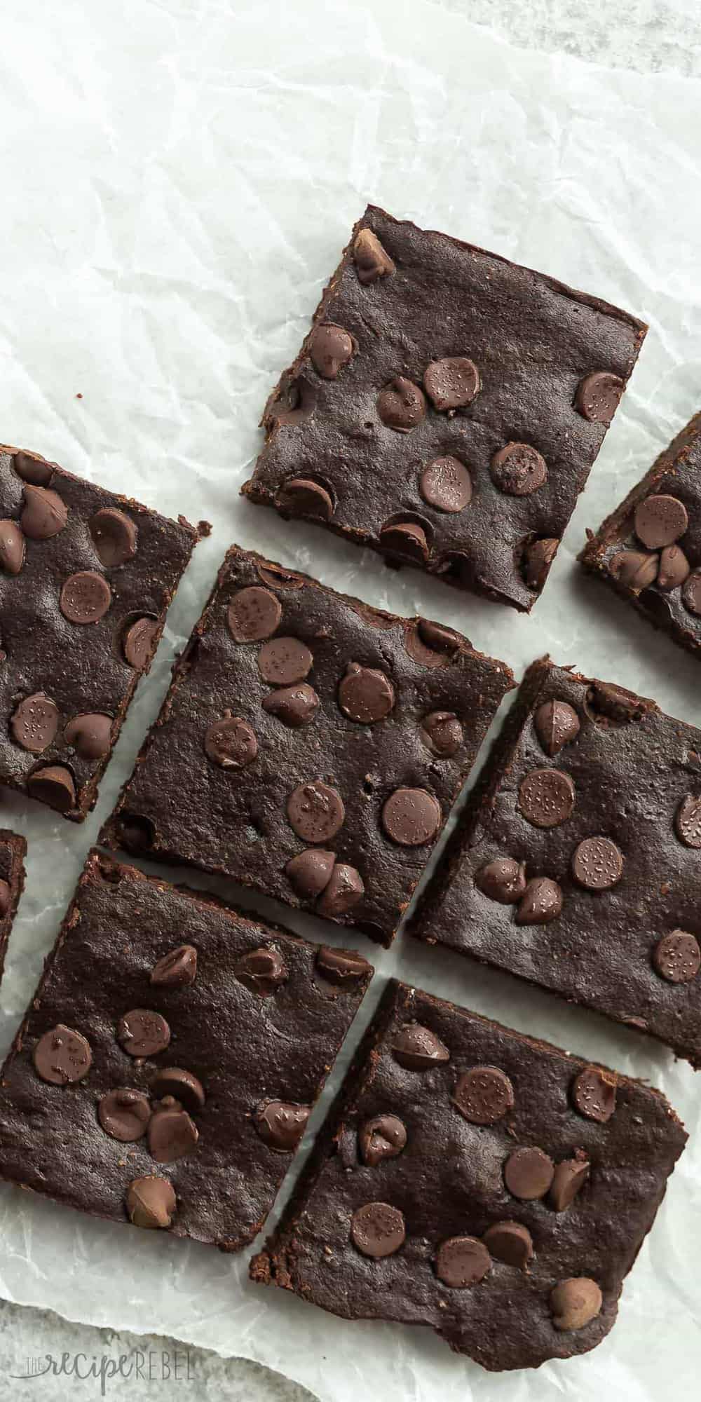 overhead image of healthy brownies cut in squares with chocolate chips on top