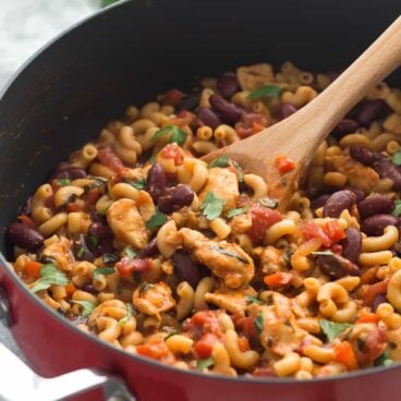 This One Pot BBQ Chicken Chili Mac is the perfect meal in one! It's loaded with protein, fiber, veggies and made in one skillet in 30 minutes! An easy, healthy weeknight meal.