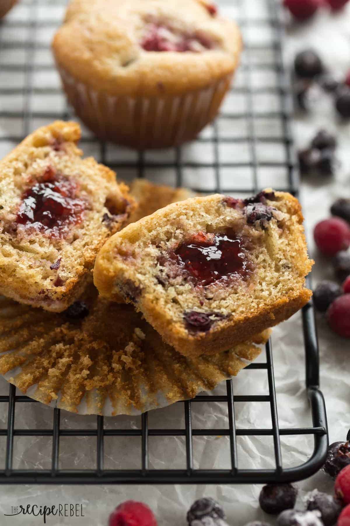 fruit explosion muffin cut in half to reveal jam filling close up
