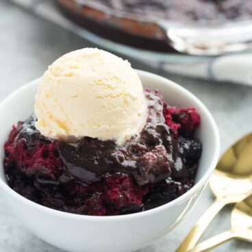 This RED VELVET Pudding Cake is so easy with only 10 minutes prep -- it has a chocolate cake base and it makes its own hot fudge sauce in the oven as it bakes and I highly recommend slathering it with a scoop of ice cream!