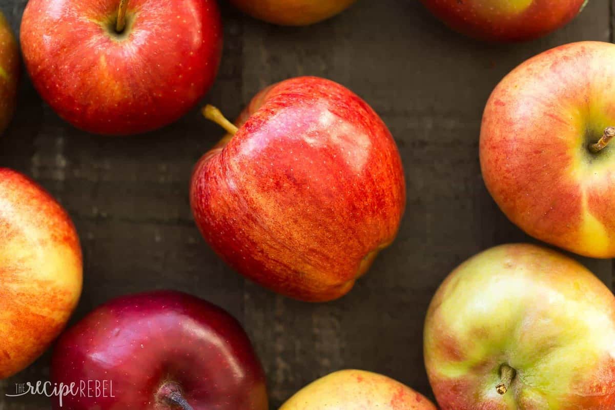 apples on dark wooden background