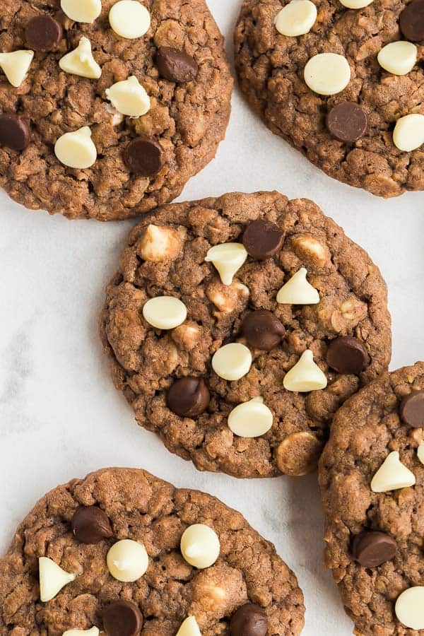 chocolate oatmeal cookies close up overhead on white background