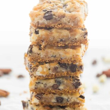 These 7 Layer Magic Bars are made with a graham cracker base, chocolate chips, nuts, coconut and sweetened condensed milk – they are the perfect mix of gooey, crunchy, sweet and salty and they are so easy!