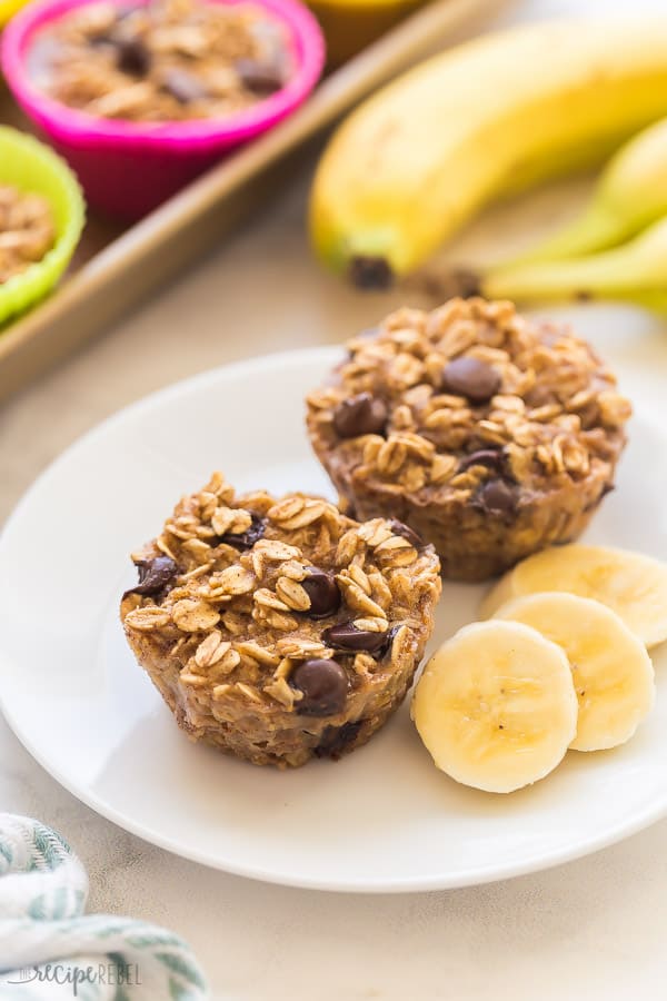 banana oatmeal cups on white plate with banana slices