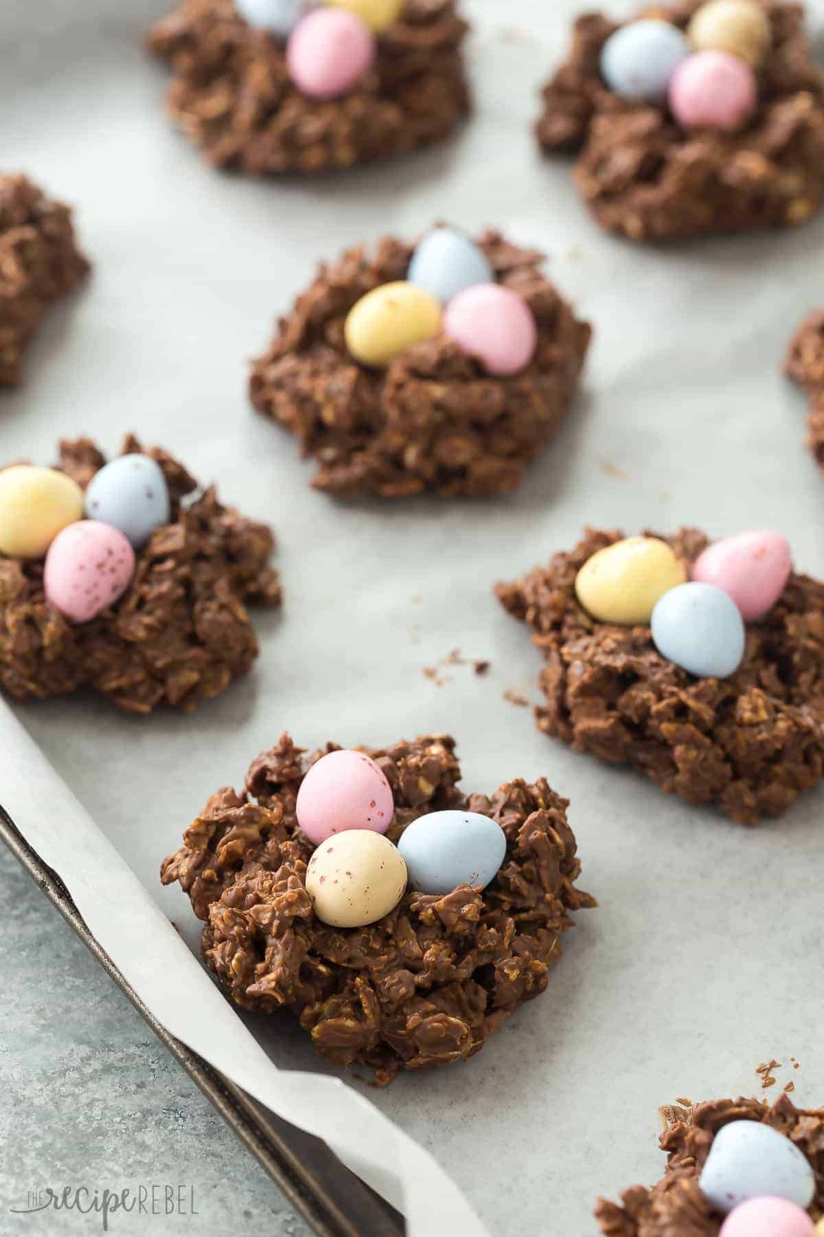 close up image of bird's nest cookie on parchment lined baking sheet