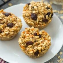 These Carrot Cake Baked Oatmeal Cups are an easy make ahead breakfast that's freezer friendly and easy to customize! Just 100 calories and high in protein and fiber. Includes step by step recipe video. | easy recipe | breakfast | brunch | make ahead | meal prep | healthy recipe | diet | meal planning