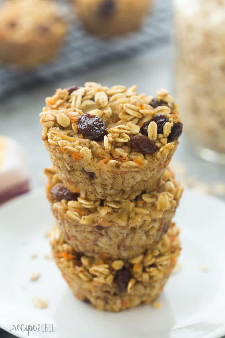 carrot cake baked oatmeal cups stacked on a plate