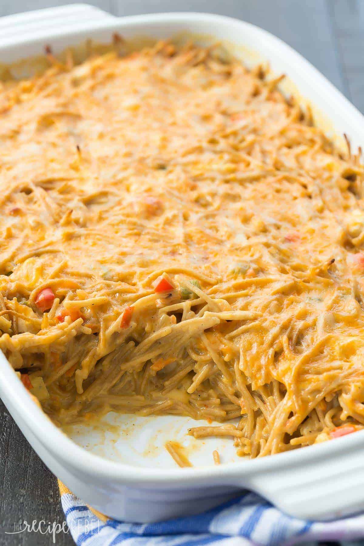 This Healthier Creamy Chicken Spaghetti Bake is a healthier version of a Pioneer Woman classic -- completely homemade with no cream soups! It's an easy make ahead and freezer friendly meal. Includes how to recipe video. | easy recipe | casserole recipe | make ahead | meal prep | kid friendly