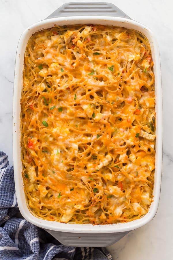 overhead image of chicken spaghetti bake in white dish