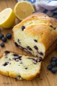 This Cream Cheese Filled Blueberry Lemon Bread is sweet, tangy and filled with a decadent cheesecake layer! Let's call it breakfast or dessert ;) Includes how to recipe video | lemon recipe | berries | summer | baking | breakfast recipe | cheesecake