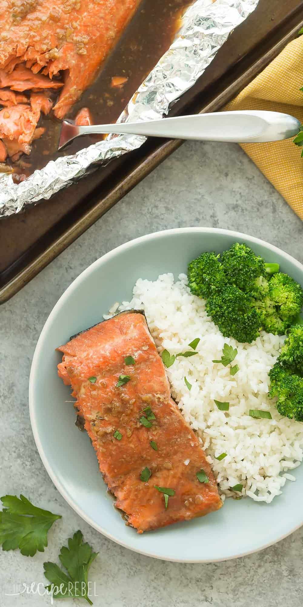 long image of honey garlic salmon piece on blue plate with rice and broccoli 