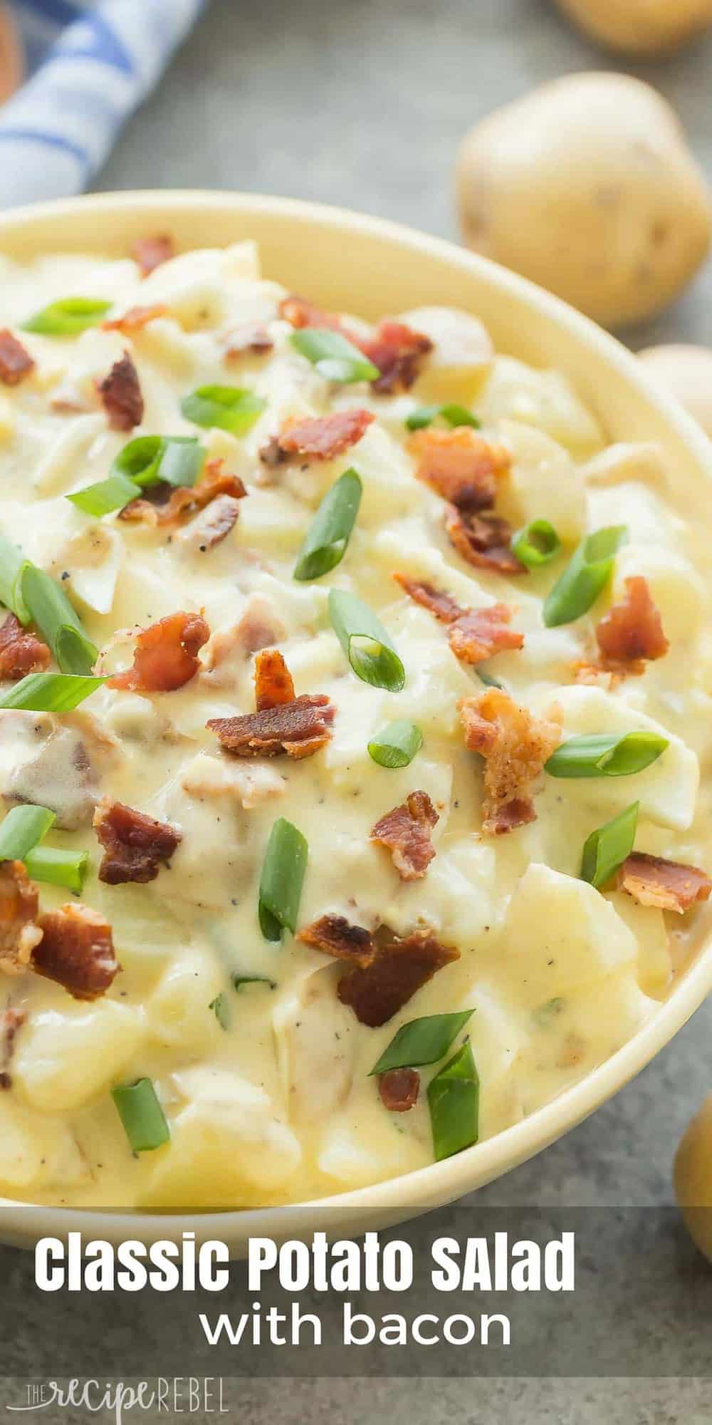 tall image of creamy potato salad with bacon and green onions with title