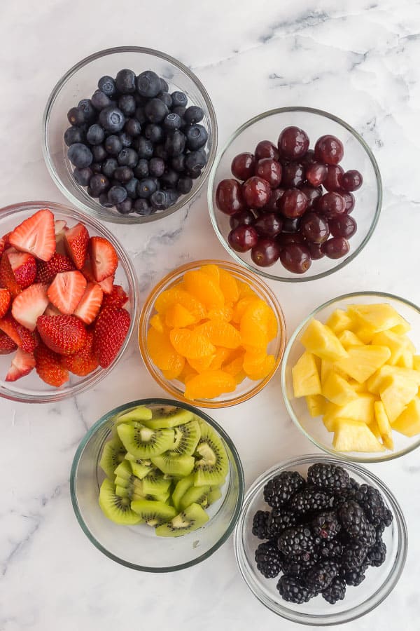 overhead image of the fruit that goes into fruit salad