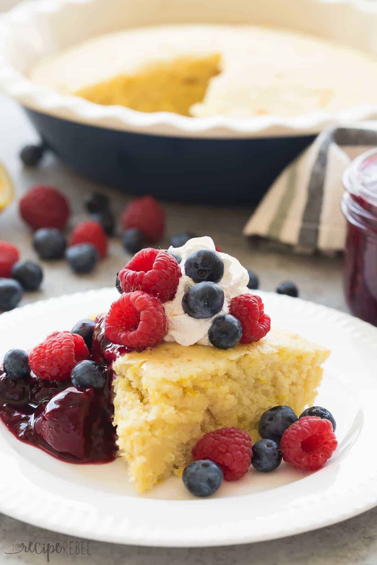 slice of lemon baked pancake on white plate with pie plate in the background