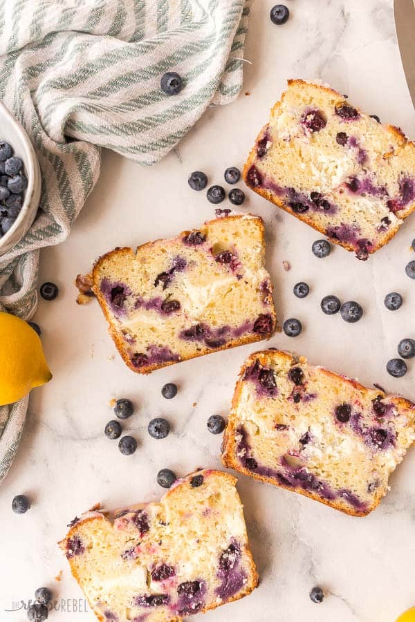 blueberry lemon bread four slices on white background