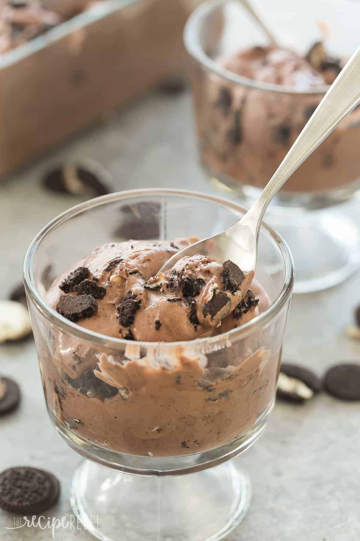 glass bowl of peanut butter oreo ice cream with spoon scooping some ice cream