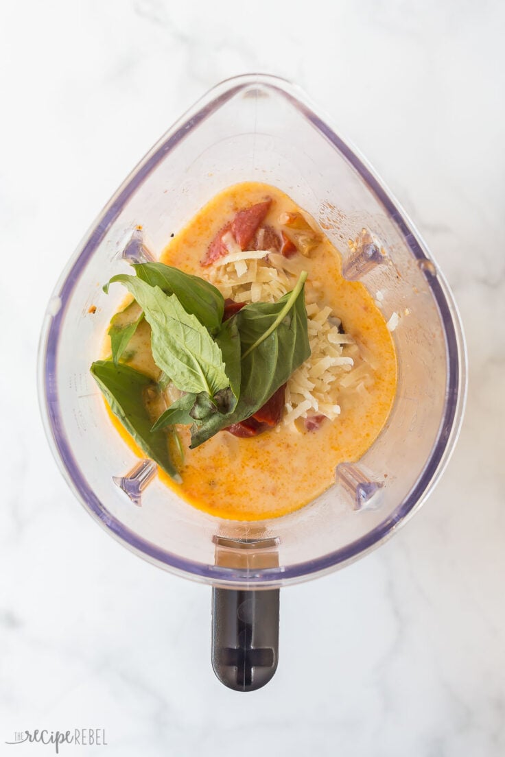 roasted tomatoes with cream parmesan and basil in blender jar